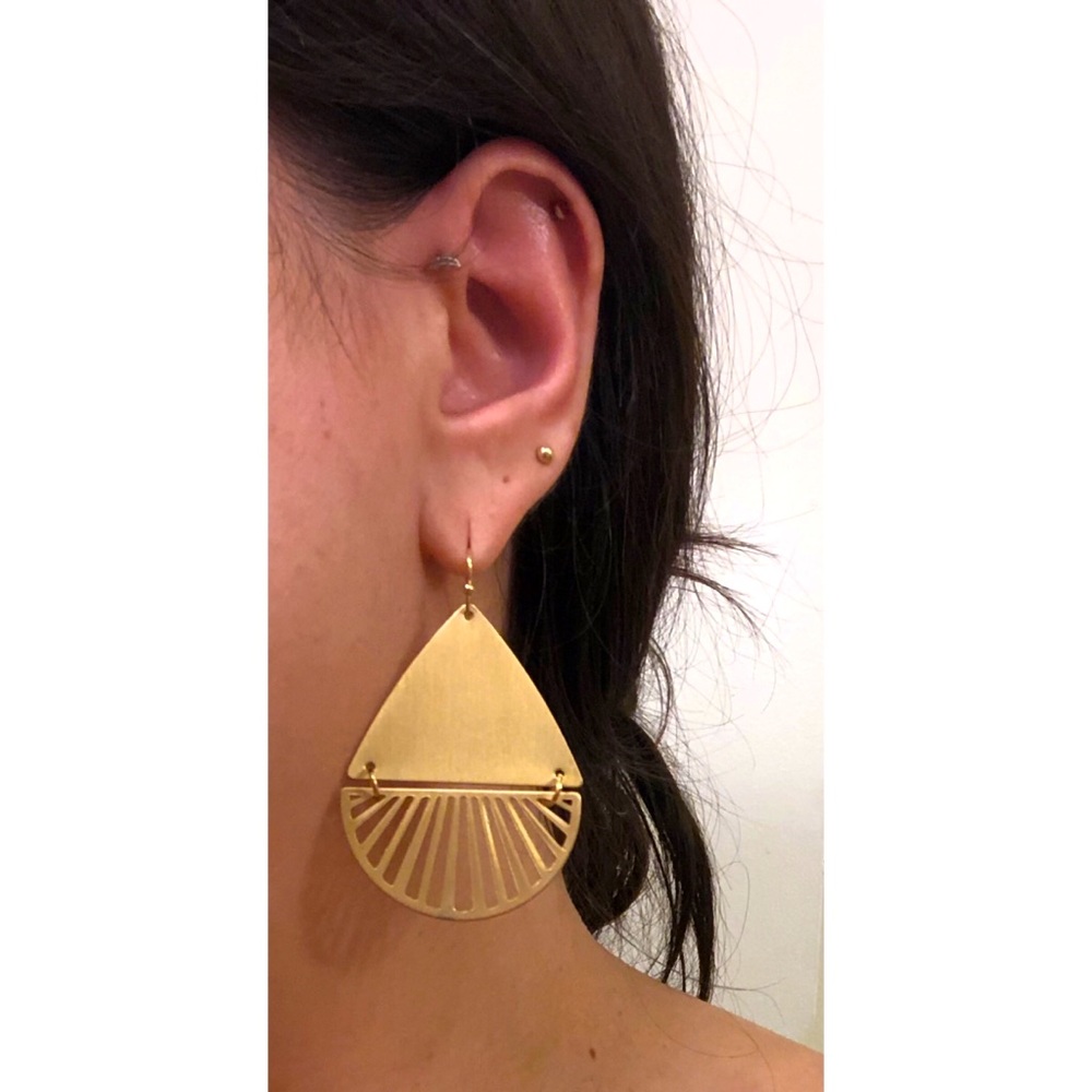 Gold large tear drop design earrings